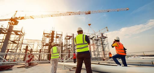 Two professionals discussing business in an office setting