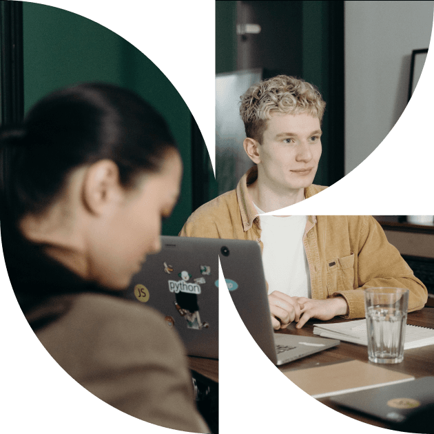 People working on laptops in an office